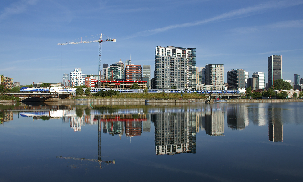 RTM 807 is reflected in the mostly still Peel Basin, along with a large number of hotels, condos and office buildings.
