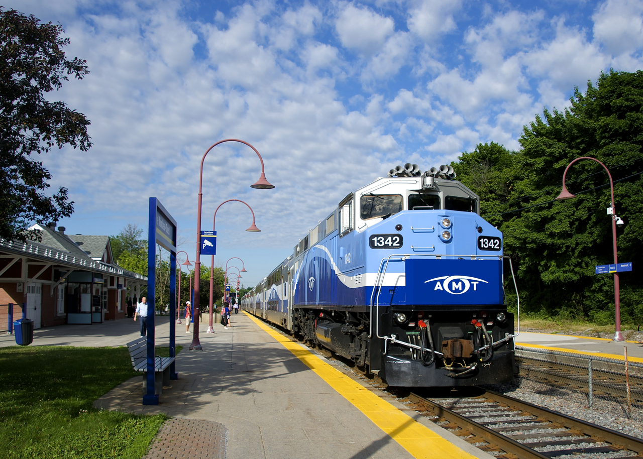 AMT 1342 leads RTM 112 into Montreal West Station on yet another humid morning.