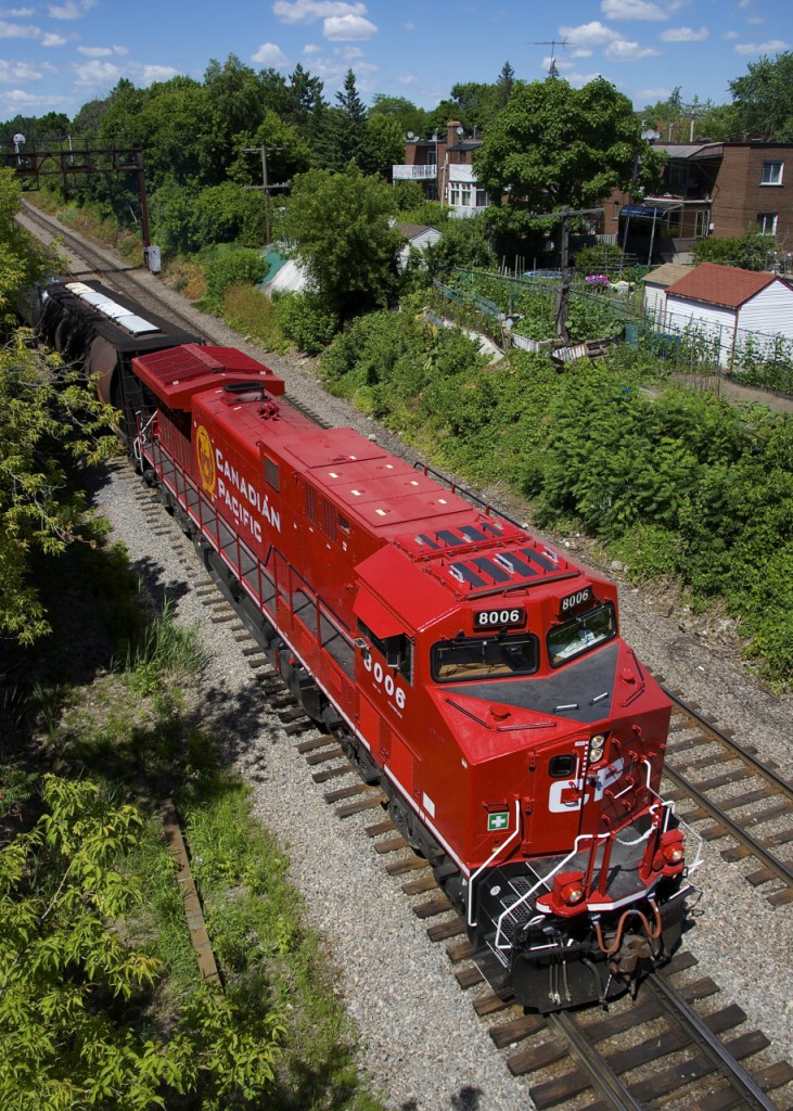 CP 8006 is an AC44CWM rebuilt from AC4400CW CP 9526 and has just entered service very recently. Here it leads ethanol train CP 650 on CP's Adirondack Sub in Montreal West.