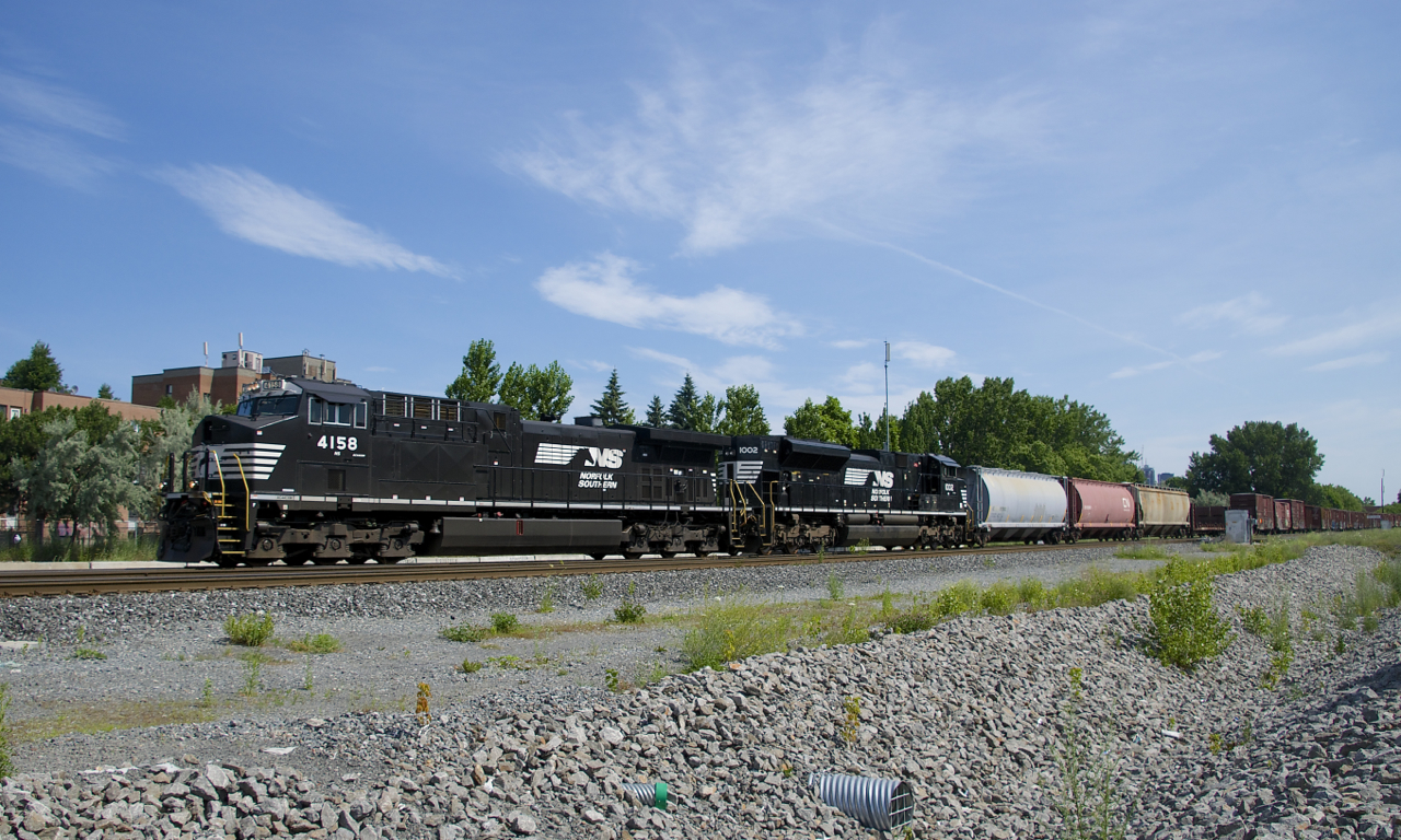 NS 4158 (rebuilt from Dash9-44CW NS 9005 just this past March) is the leader on CN 529 as it heads west on CN's Montreal Sub with NS 1002 trailing. This train has been running at night for the last little while, but a delay with this train much further south put it into Montreal mid-morning for once.