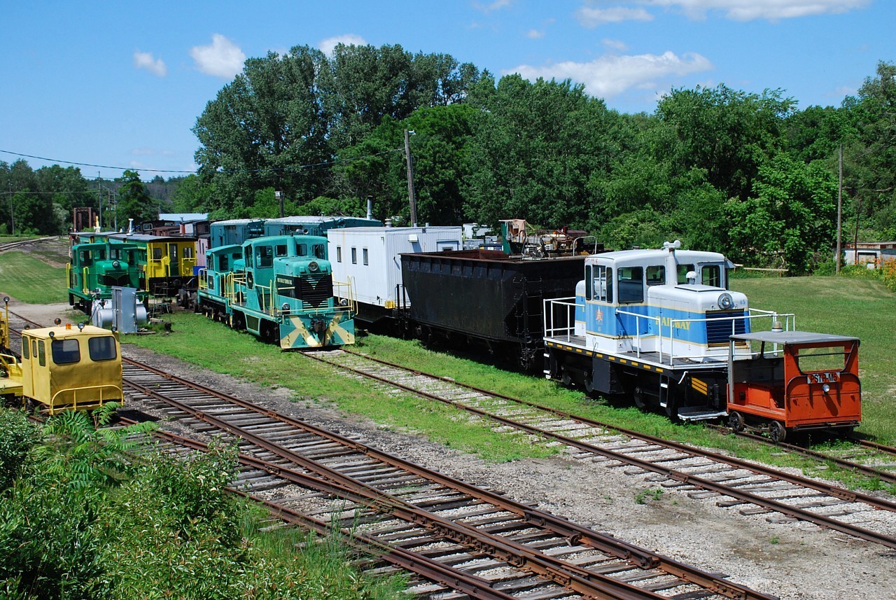 It looks like Trillium Railway GE 45-ton number 45 has found a new home on the Port Stanley Terminal Rail.  Also relatively new to the PSTR is a former Zalev Brothers (scrap yard in Windsor, ON) GE 45-ton.  It has already been repainted PSTR green/black but presently rests on blocks while the trucks get some attention.  There's lots of interesting equipment stored / under restoration in the yard.
