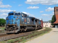CN 435 slows to work the yard in Brantford with a pair of ex. LMSX C40-8Ws leading.  When I first saw it rounding the curve it almost looked like a very late NS 327 approaching with a Conrail leading.  One can dream.  Instead we have these "beauties"...  
