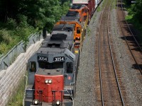 “Canada’s Tunnel Motor”  What is it with certain locomotive types that seem to get so much attention over others, we all have our favourites. The “Tunnel Motor” design was unique to the Southern Pacific and sister road Cotton Belt. It allowed the unit to pull cooler air from the bottom of the many tunnels along the SP route greatly reducing overheating of the units. The design was also applied to SD40 models. The design serves no purpose on the Goderich Exeter other then the high horsepower that comes with the SD45 variant, but is a one of a kind unit in Canada giving it a big following by Railfans. The unique unit along with a GEXR and SOR SD40 are at full throttle as they charge towards the Niagara Escarpment while departing Silver and heading into the Guelph sub. I will truly miss these sights and sounds this fall as CN takes back GEXR ‘s operations over the Guelph Subdivision.