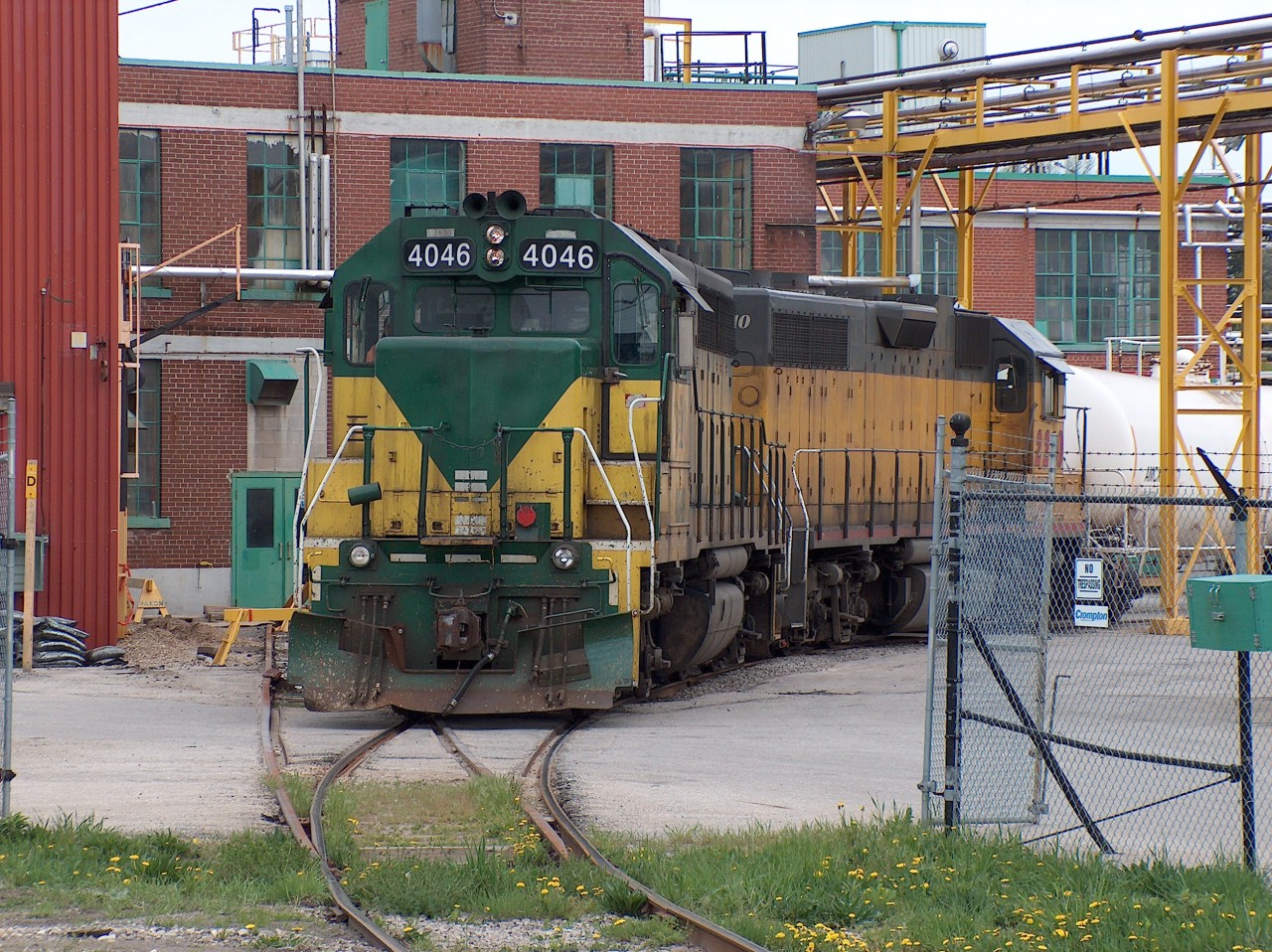 Here is a view of GEXR operations in Elmira back in the spring of 2007: the local from Kitchener Yard to Elmira is captured switching an industrial facility. A recent Google search indicated that this facility is called Canada Colors and Chemicals (lots of VOCs). I cannot remember this train symbol but the power was GEXR 4046 and LLPX 2210.