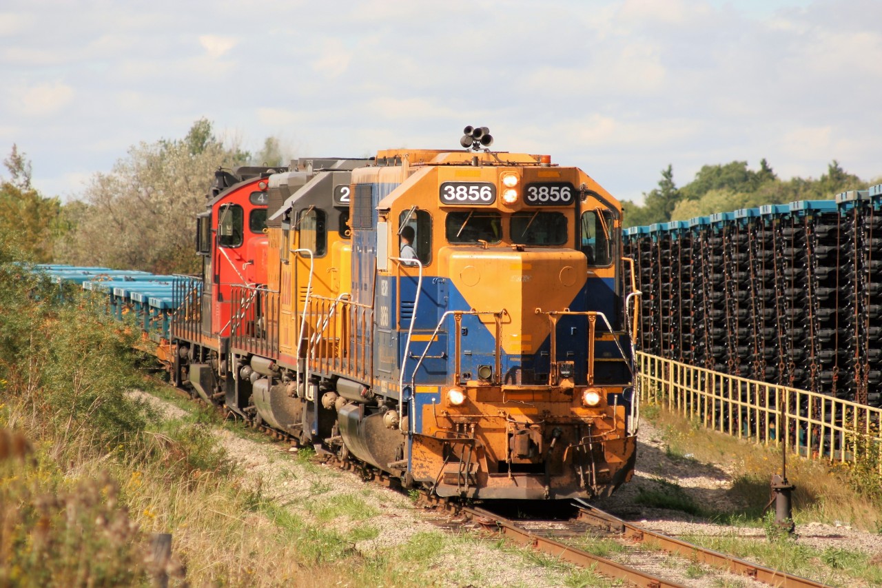On September 11, 2007 GEXR train 433 is seen setting-off empty frame cars at the then ThyssenKrupp Budd Canada facility. The consist includes GEXR GP38 3856, LLPX GP38AC 2210 and CN GP9RM 4141. The CN unit had arrived from London that night on an extra that had delivered several pieces of equipment for the new Waterloo Central Railway from St. Thomas. It would then hitch a ride on 433 back to London with a train load of newly manufactured vehicle frames from Kitchener.
