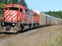 A westbound Canadian Pacific train with a pair of SD40-2's adorning the multi-mark scheme is
seen passing by Mile 54 on the Galt Subdivision, just east of Galt, Ontario. 