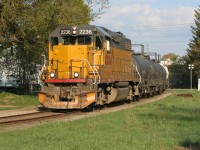 LLPX GP38-2 2236 leads Goderich-Exeter Railway (GEXR) train 584 as it approaches John Street in Waterloo, Ontario on the Waterloo Spur. The train has five tankers destined for the chemical facilities and the end of the line at Elmira.