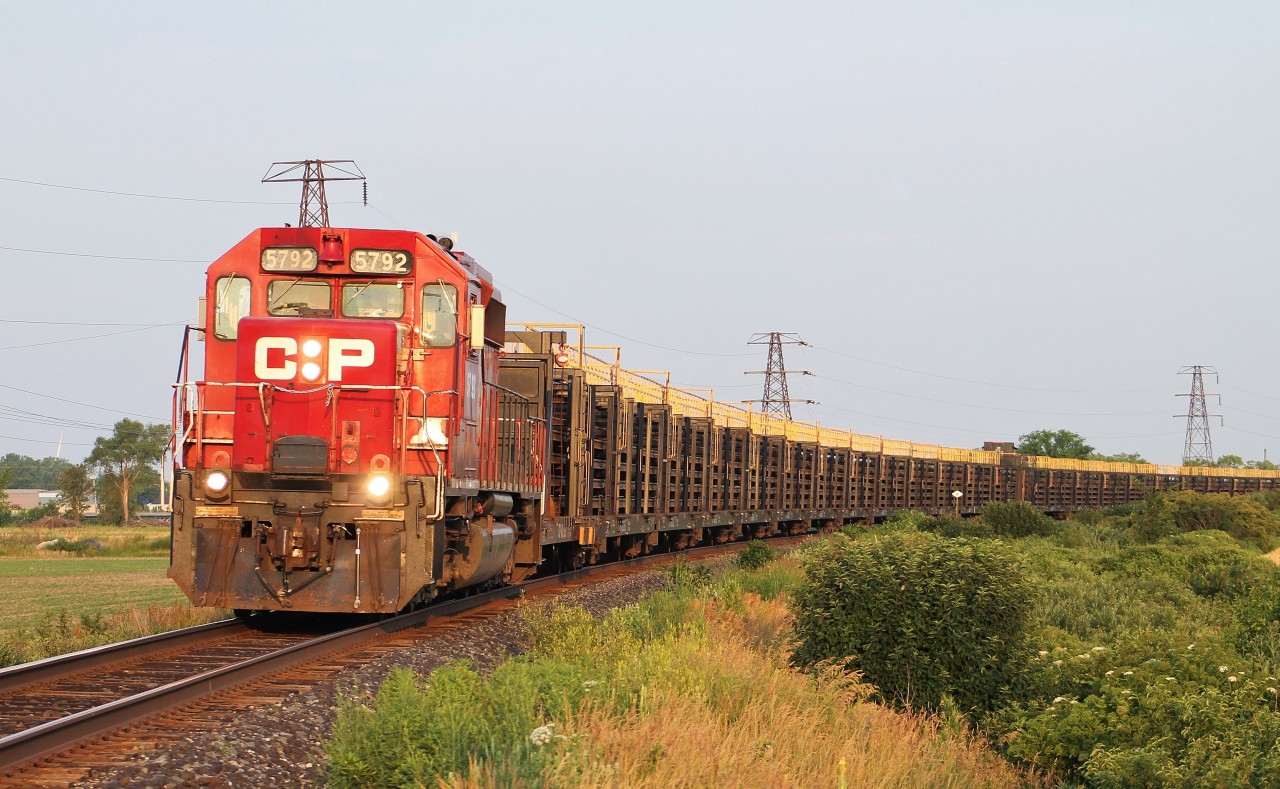 A CP rail train with a classic SD40-2 leading negotiates the tight curve on the east side of Tilbury.