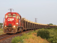 A CP rail train with a classic SD40-2 leading negotiates the tight curve on the east side of Tilbury. 