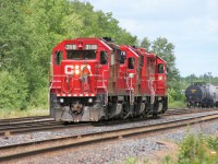 Canadian Pacific train T69 is seen switching at Guelph Junction in Campbellville, Ontario with a trio of GP38-2's that include 3129, 3076 and 3118. 