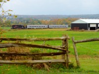 With Engr. Steve Bradley at the throttle, he's making sure patrons of the Credit Valley Explorer get great views of the countryside as fall colours begin to make way for Winter. This is Branchline railroading at its best, near Boston Mills on the former CP Owen Sound Subdivision. I was the only photographer out this day, and it was a glorious relaxing outing. 
