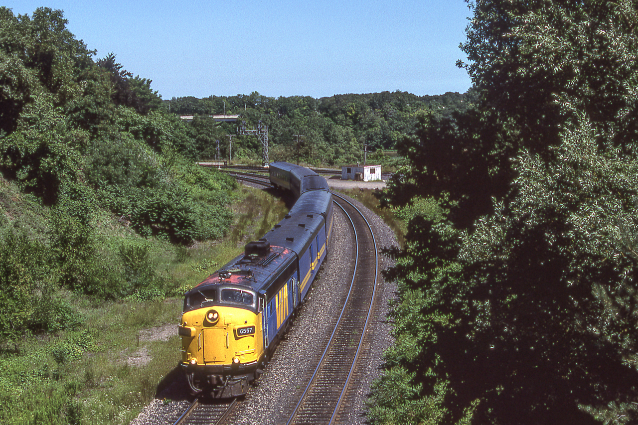 VIA 6557 (Ex-CP) is westbound at Bayview Junction, Ontario on August 11, 1987.
