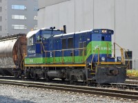 VITX 2010 sports Flexicoil-B trucks, unlike its similar sibling VITX 2020 which rides on AAR Type A. Both locomotives are NRE 1GS7B genset units of 700 HP. Note the "T3 Power" Decals framed by the handrail. <br> Viterra is a major grain elevator operator at the Port of Vancouver. Their locomotives are used to move cuts of grain cars as required, including spotting them over unloading chutes. 