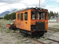 I was still down in Skagway when the 5 days a week WP&YR passenger train to Carcross was laying over from 12:30 to 1PM.<br>
However I found this Fairmont A6-F4-1 track gang car with trailer, asleep a few tenths beyond Carcross station on the otherwise out-of-service track leading to Whitehorse. Purchased new by WP&YR in 1976, this Ford powered  gas-mechanical speeder apparently continues to be used as needed. <br>
Fairmont closed down their business by 1979; I expect this is one of the last built for 3 foot gauge track. Can't be many railways with operational Fairmont speeders nowadays. Hi-rail pickup trucks are more versatile - they are a good fit for standard gauge track, but not narrow gauges.

