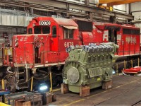 Posing beside a newly delivered GEVO engine is DME 6078 an ex CP SD40 #5562.