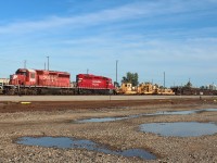 A pair of SD40-2's pull in with a work/rail train to lay up for the night.