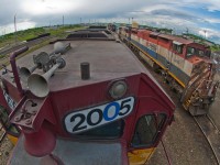 CN, IC, BCOL, and WC units lounge about Fort St John yard on a slow weekend.  Taken with a 10.5mm fish eye lens. 