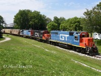 GTW 6420, CN 7046 and GTW 6221 shove a cut of 7 cars into the elevator in Sarnia.