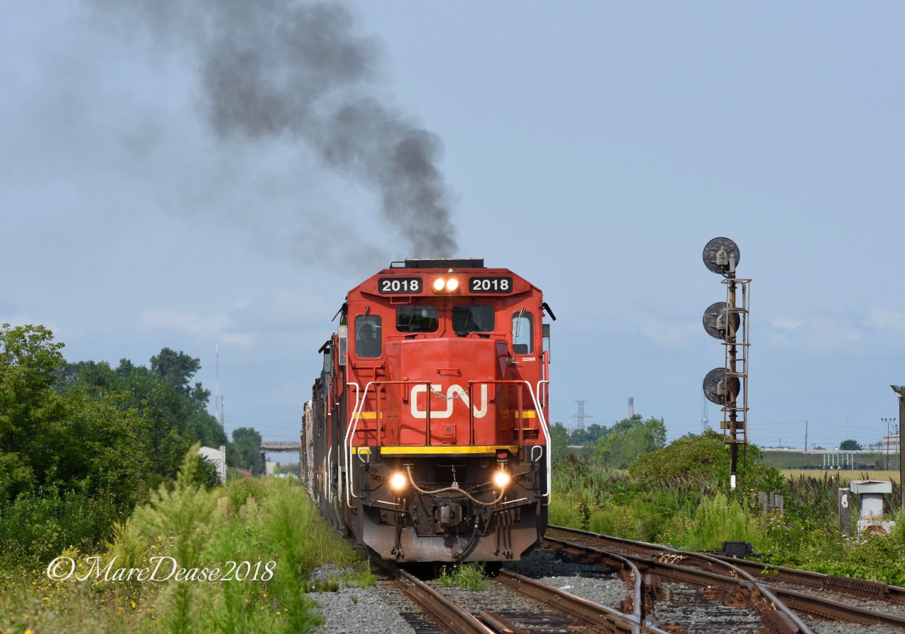CN 2018 throttles up departing Sarnia east bound.