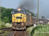 A smokey GECX 7356 rolls into Sarnia at Hobson.