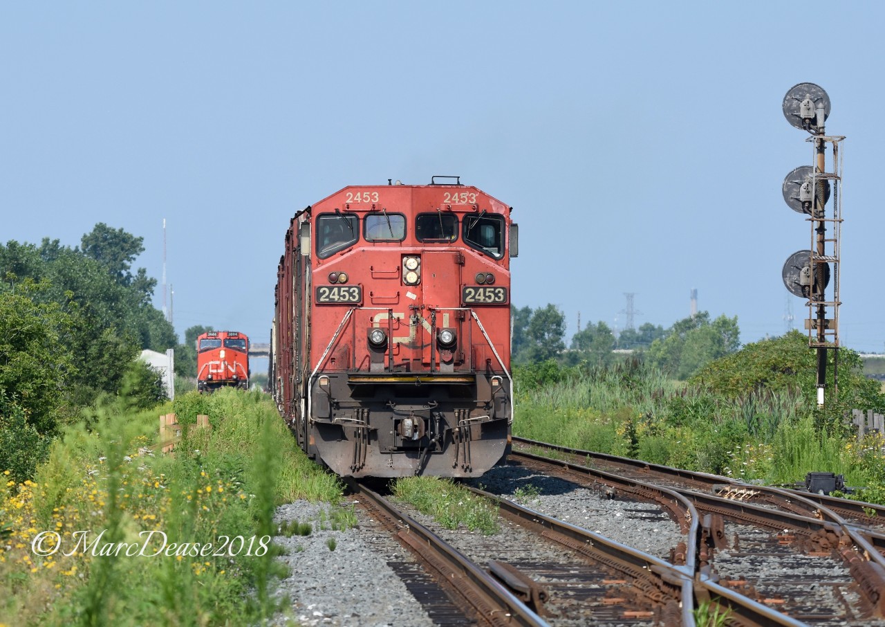 Train 382 shoves back into the yard at Sarnia, ON., as the daily 509 train waits on the east departure for it to clear.