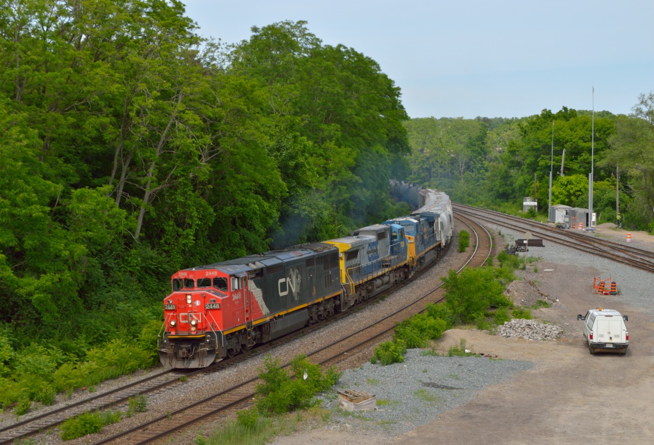 Nice power leads this CN freight through Bayview starting upgrade for the climb to Copetown.