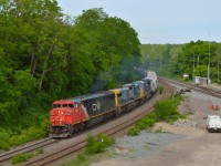Nice power leads this CN freight through Bayview starting upgrade for the climb to Copetown.