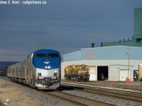 VIA and Amtrak's Maple Leaf passing by CN's Parkdale ave Steel Centre in Hamilton. As you can see, this was my last photo of the morning and I almost didn't get it.