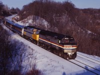 A late Amtrak "Maple Leaf", VIA train 97 to New York City, rolls through Bayview behind Amtrak F40PH 242 and VIA 6443 in the early afternoon. The consist suggests a power failure; however, I don't know the reason for the delay this day.