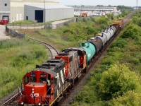  I have always had a fascination for CN’s rebuilt GP9RM’s, and with the ongoing delivery of rebuilt GATX GP38’s, it appears that their days may finally be numbered. They are the oldest operating fleet of locomotives out of any of the Class 1 Railroads. CN 4138 has been unique for many years now as it still carries the fictional AR Illinois lettering on its nose that was applied for a tv production. I think I will miss these units the most since the loss of the MLW’s. Here we see local 551 heading to work the chemical facility near Mansewood after working the old glass lead and Westrock.