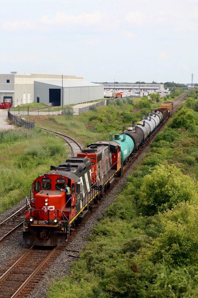 I have always had a fascination for CN’s rebuilt GP9RM’s, and with the ongoing delivery of rebuilt GATX GP38’s, it appears that their days may finally be numbered. They are the oldest operating fleet of locomotives out of any of the Class 1 Railroads. CN 4138 has been unique for many years now as it still carries the fictional AR Illinois lettering on its nose that was applied for a tv production. I think I will miss these units the most since the loss of the MLW’s. Here we see local 551 heading to work the chemical facility near Mansewood after working the old glass lead and Westrock.