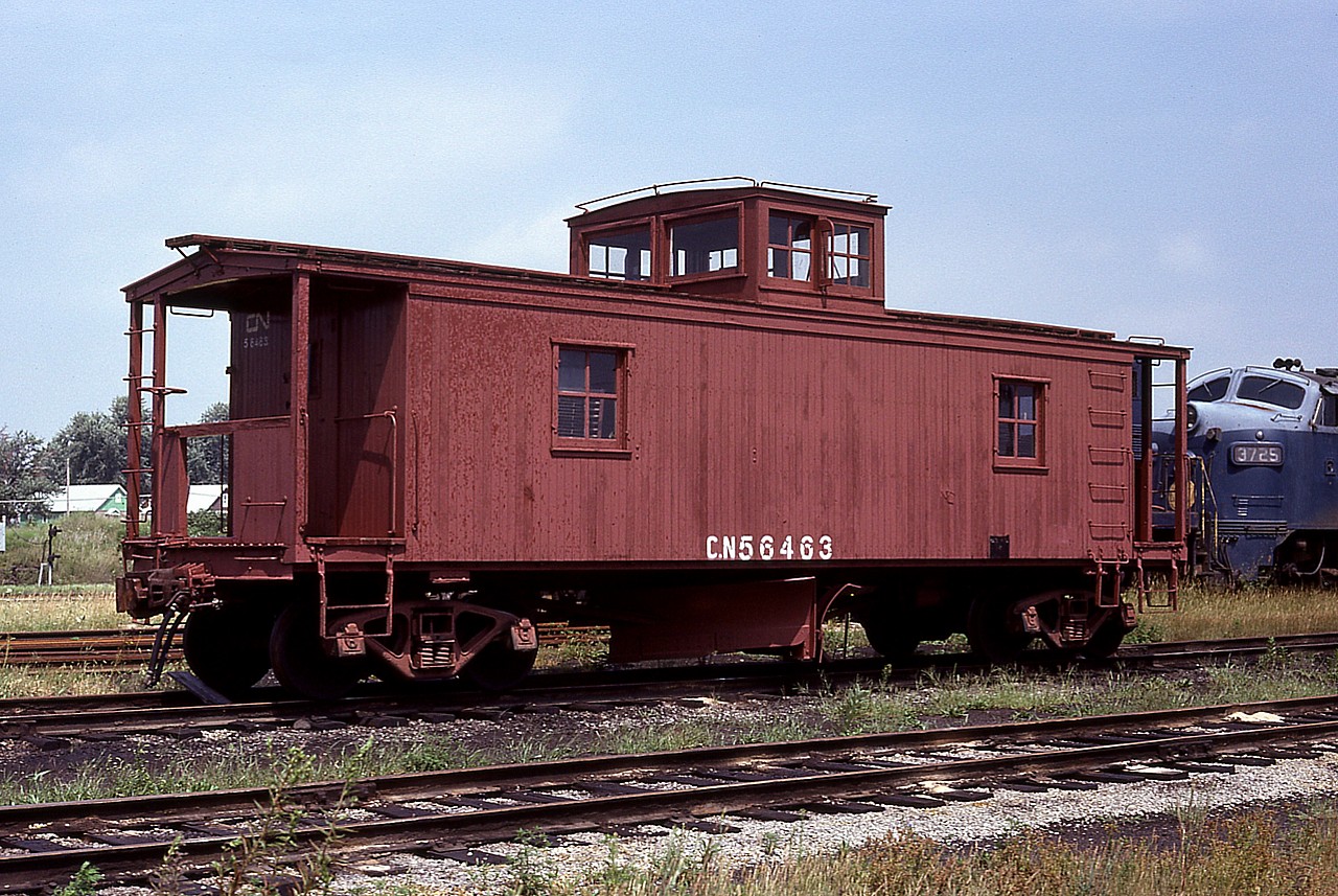 Nice shot of an old wooden CN Flanger resting in the sprawling Fort Erie CN yard on a sunny day many years ago. This relic was built in 1948, but I do not know the year of its' disposition. Location of photo rather obvious :o) as to the right is the N&W 'F' 3725 that could often be found in Fort Erie back then.