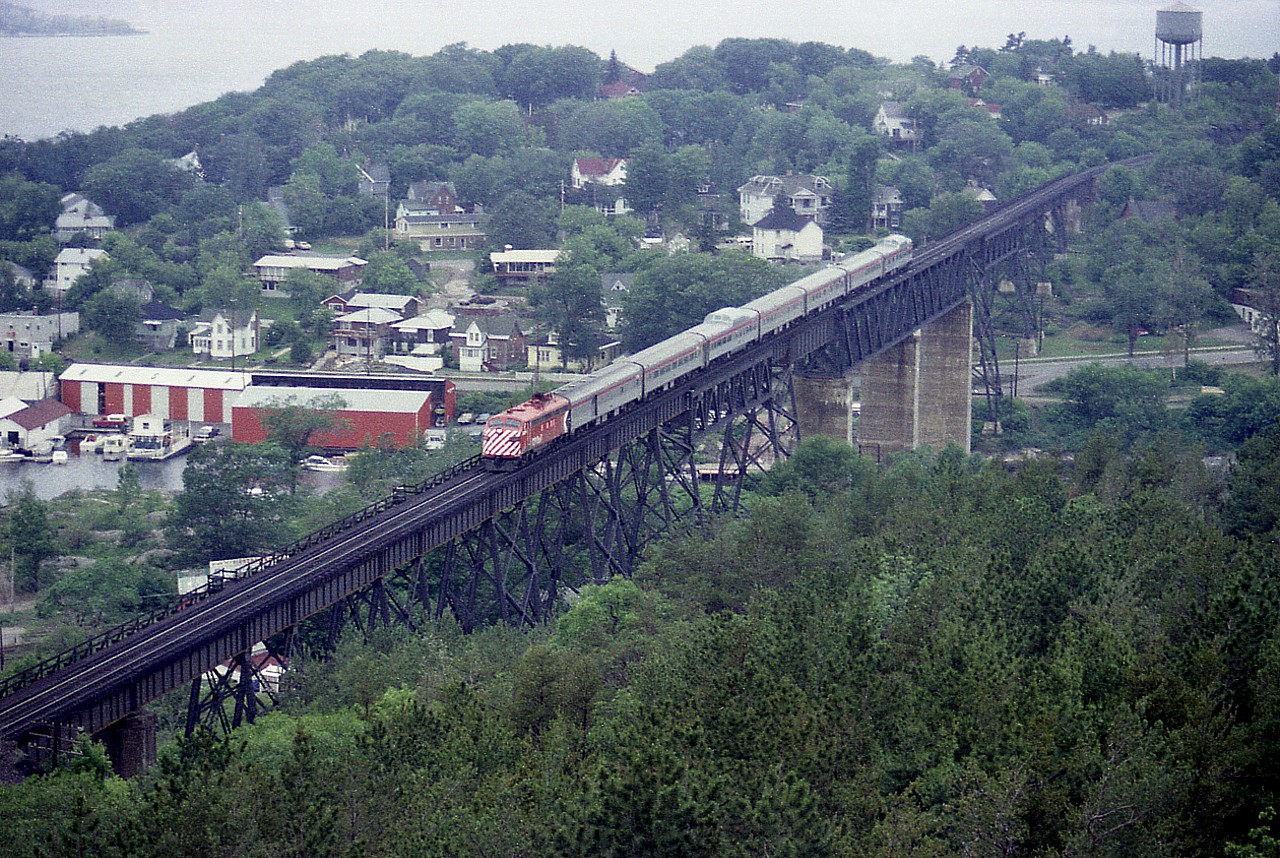 Before the days of VIA and before the days of CP and CN pooling their resources, this all-CP 'Canadian" from Sudbury to Toronto is seen running southward over the Parry Sound trestle on a rather dull afternoon. Photo is from the fire station tower.