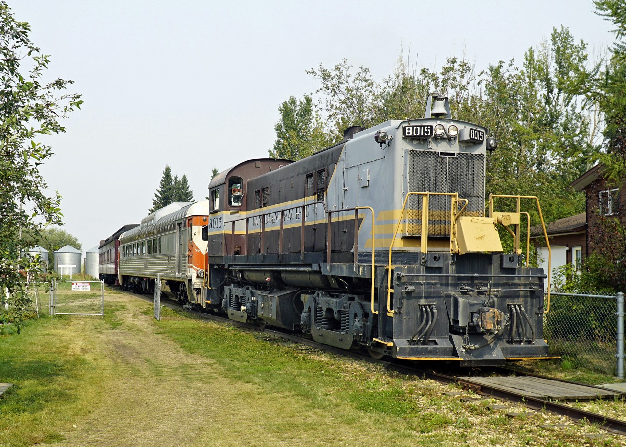 MLW RS-23 sits in farm country surroundings waiting to move into the station for the 13:30 run.  The Budd RDC is non operational but is the passenger car to ride in.