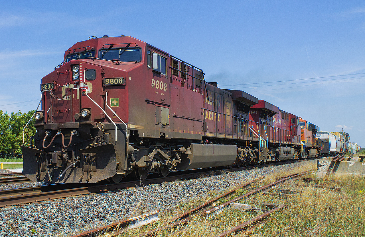 Standing on what I am sure was a platform at the old site of the CP station in Tilbury, I was able to chase and successfully catch this eastbound train led by 9808. Part of the intrigue was the BNSF unit, third in line. But also the slow mover that it was. It met a westbound, and looking back I wish I stayed in my spot as the lighting was better here for that westbound than it was at home base in Chatham. Guess it proves that sometimes, you can't get them all. But it makes you appreciate the ones you do catch!