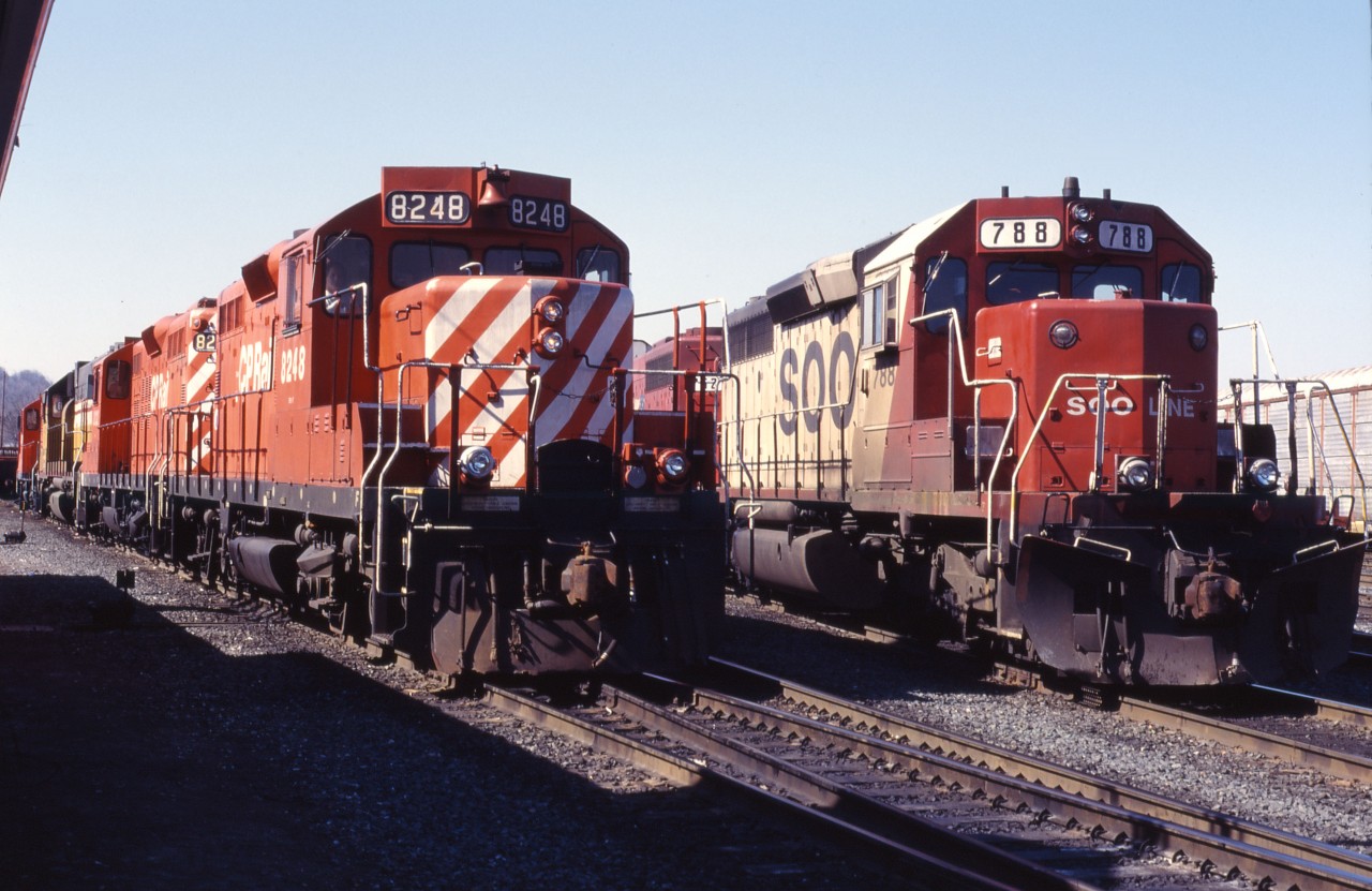 In the early-mid 1990s, CP GP9 rebuilds and SOO Line power were common on the "Ham sub". Here we see CP GP9u 8248, 8222, HATX 215 and 8231 ready to lift SOO SD40-2 788 and another SOO unit before heading east to Toronto.