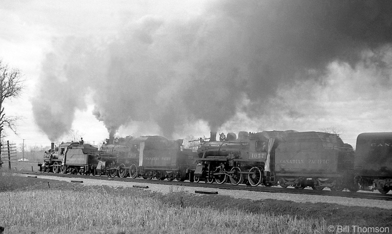 CPR 136, 815 and 1057 lead the famed triple header steam excursion of May 1st 1960, putting on an impressive smoke show heading through Erindale (Mississauga) near Mavis Road.