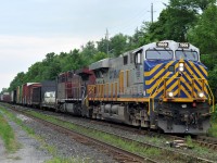 Doing their best to hide the fact that it's a CN train...CREX 1509, and CP 9668, haul a 143 car M38331 31 through Hardy