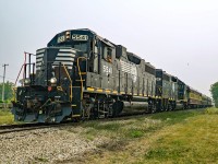 The "Wheatland Express" departs Cudworth on route to Wakaw headed by GP38-2s 5541 and 5543.