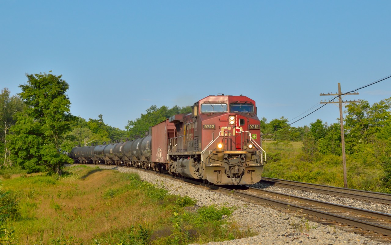 CP 650 heads east nearing Kelso on the Galt Sub.  Shoving on the rear is CP 8719.