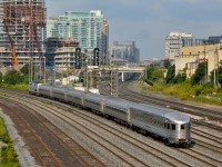Private Pullman car <b><i>Babbling Brook</i></b> brings up the rear of Amtrak/VIA 97 as it departs Toronto for New York.  This car was built by Budd in 1949 for the New York Central Railroad's eastern passenger teains.  Babbling Brook soon traversed the very rails pictured above as it became part of the Canadian Pacific Railway fleet under the name <b><i>Seaview</b></i> in 1959 for use on the Montreal - Ottawa - Toronto <i>Pool Train,</i> jointly operated by the CNR and CPR.  The car was again sold in 1969 to the Cartier Railway, losing it's name for the number 847 and working in the far northern reaches of Quebec.  Kasten Railcar Services Inc. purchased the car in 1986 and after making repairs and upgrades the car was sent through various owners to get where it is today; owned by John Webb III and rolling throughout North America.