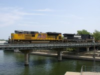 CN 543 (with UP 8972 & NS 9674 for power) is crossing the Lachine Canal with baretables for the Port of Montreal.