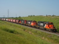 CN L512 makes its way up the Beamer Spur in Fort Saskatchewan AB with a stellar consist. 
