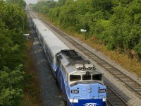 AMT 1340 leads an eastbound on CP's Westmount Sub during the morning rush hour.