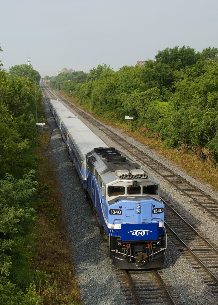 AMT 1340 leads an eastbound on CP's Westmount Sub during the morning rush hour.