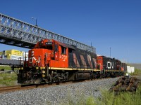 CN 4707 & CN 7054 are leaving the Turcot Holding Spur after dropping off a boxcar at the Kruger plant.