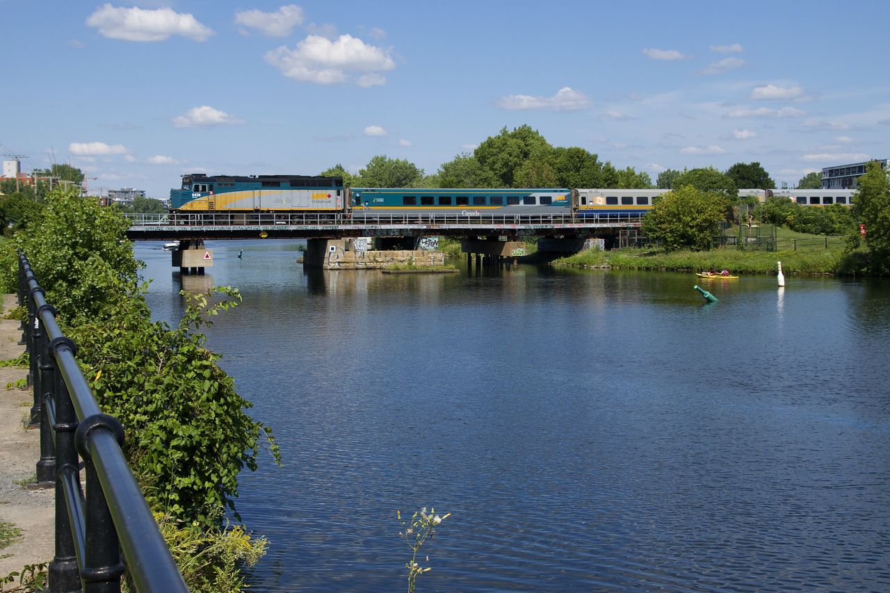 VIA 6438 leads VIA 635 over the Lachine Canal on a gorgeous summer afternoon.