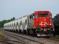 CN 580 returns to Brantford with a dozen cement hoppers from Princeton.  The fish flies are bad, but you should see the size of the butterflies around here!