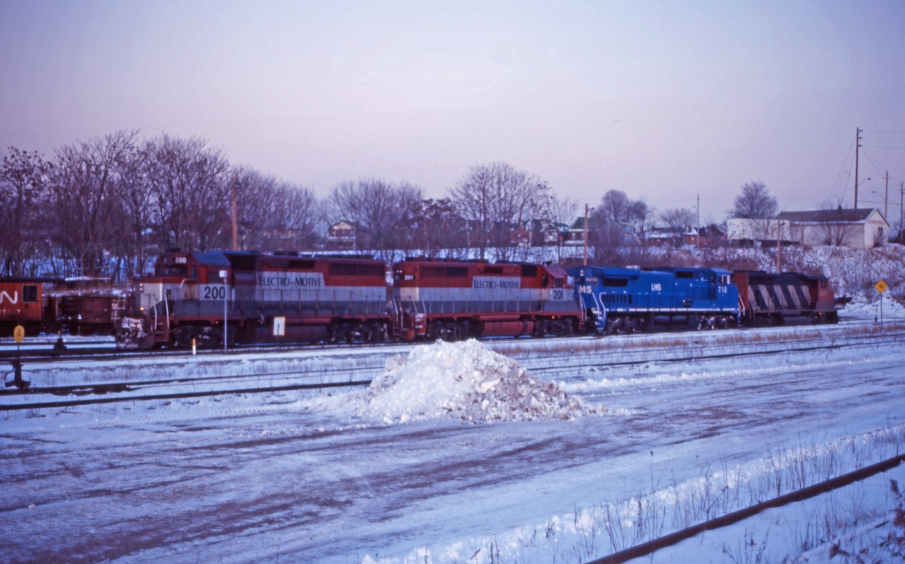 Two former GO Transit/Rock Island GP40s, now owned by EMD and leased to CN, prepare to work Hamilton Yard on a cold day in January 1995.