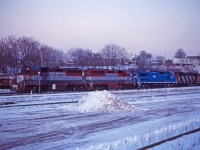 Two former GO Transit/Rock Island GP40s, now owned by EMD and leased to CN, prepare to work Hamilton Yard on a cold day in January 1995.